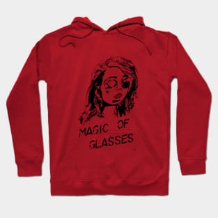 The magic of glasses , a black sketch of a woman with a caption . Hoodie